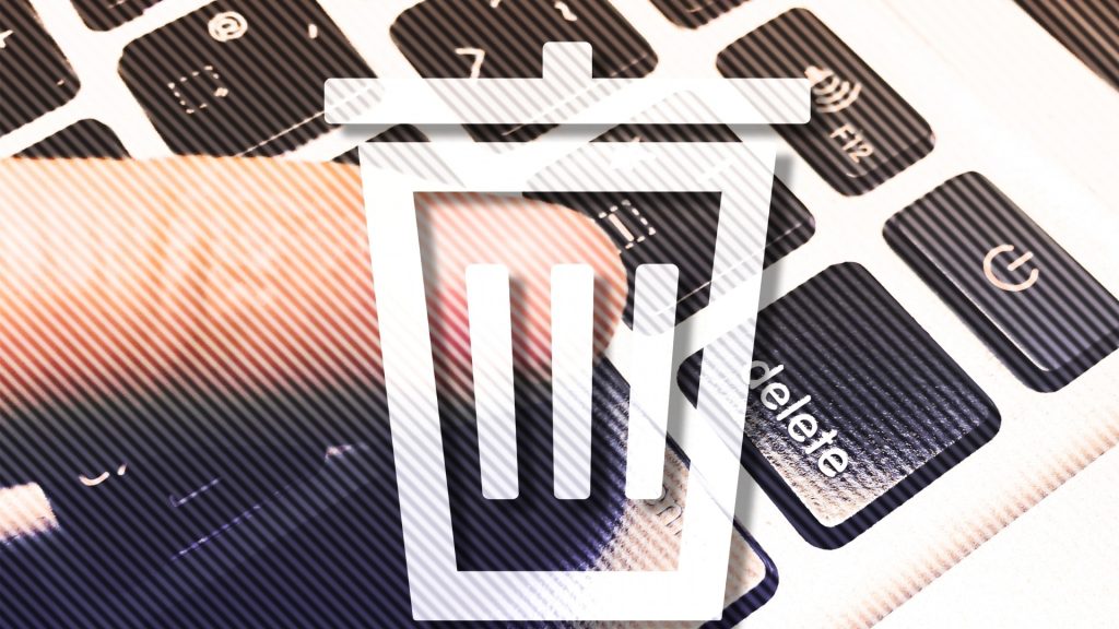 パソコンのdeleteキーでファイルを削除し、ゴミ箱へ移動させる操作をしている。ゴミ箱の設定に注目しているイメージ。